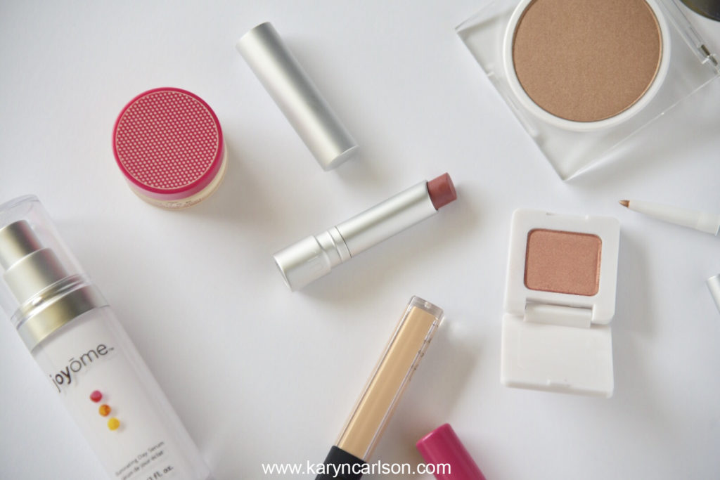 spring beauty products with lipstick lip balm peach shadow and bronzer